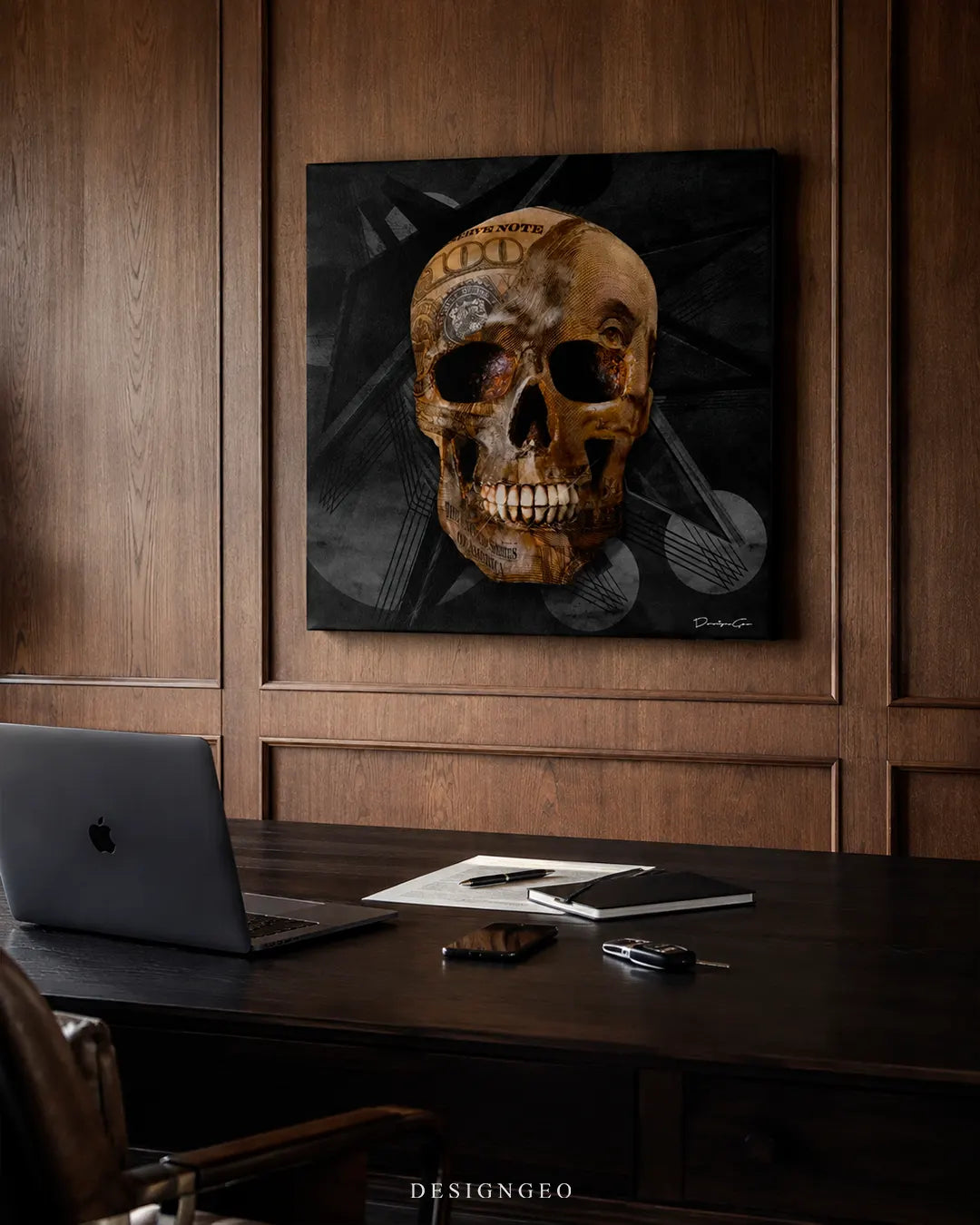Square dollar bill skull canvas wall art mounted on a dark wood-paneled wall in a luxury executive office above a dark wooden desk with a laptop and leather chair