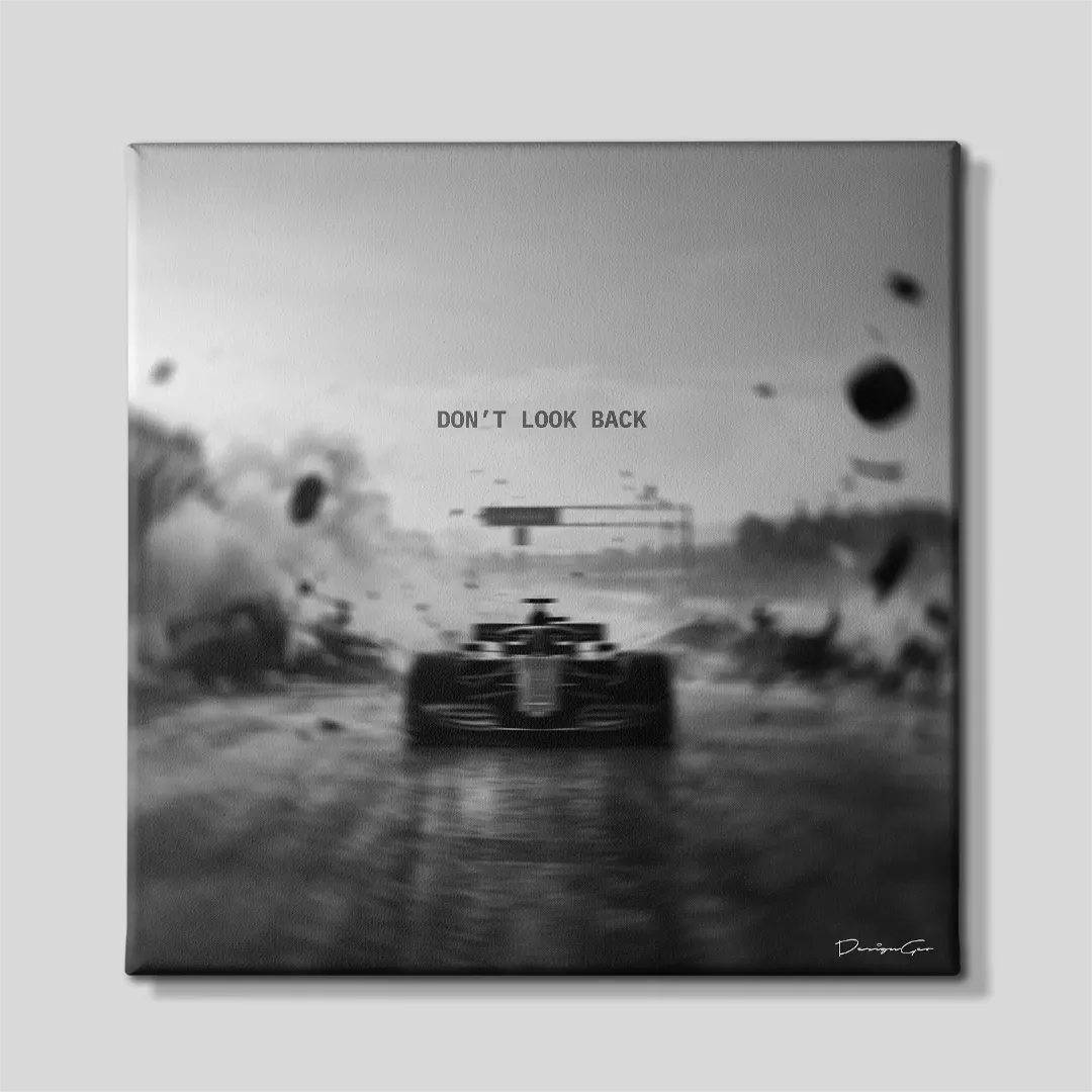 Black and white square motivational canvas wall art featuring a Formula 1 race car driving forward through track debris and smoke under quote Don't Look Back 0.75 inch thin wrap