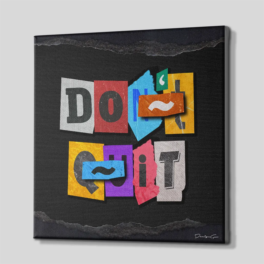 Three-quarter side angle of the Don't Quit motivational collage black canvas print showing gallery-wrapped dark edges mounted on a wooden frame
