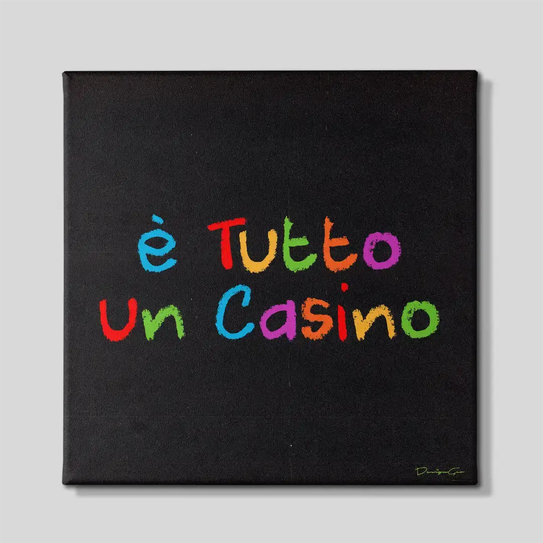 Front studio view of the "È Tutto Un Casino" square canvas wall art, featuring a bold and colorful Italian quote design on black canvas, ideal for modern living rooms