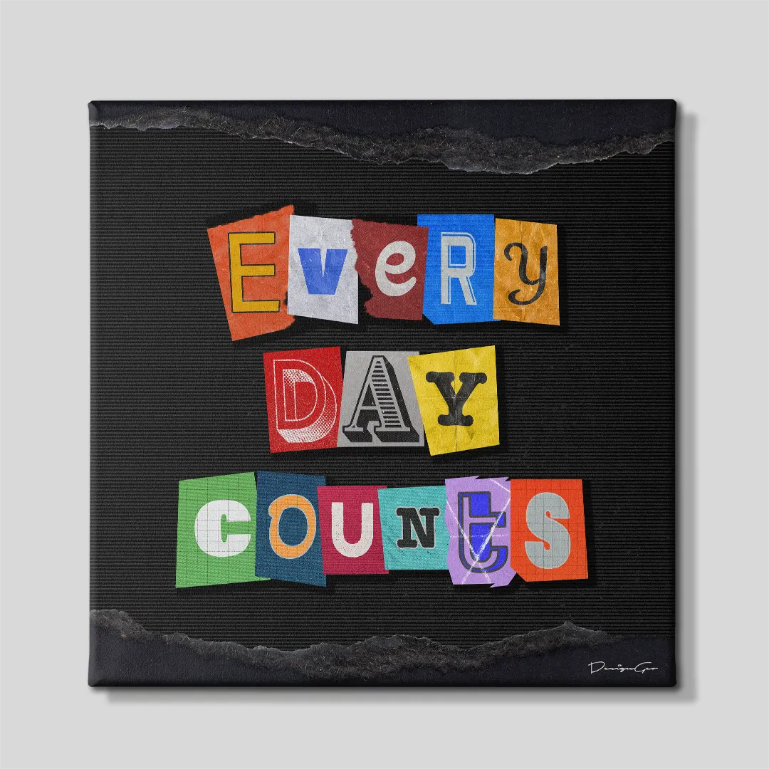 Front view of the square motivational canvas print featuring the phrase "EVERY DAY COUNTS" in colorful magazine cutout letters on a textured black background with ripped paper borders