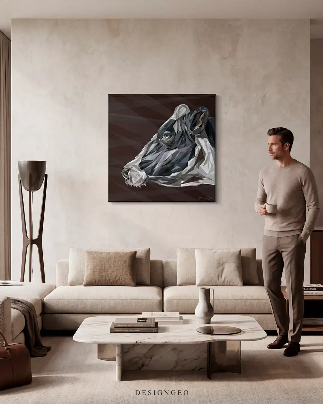 Modern livingroom interior displaying the abstract geometric cow portrait square canvas art above the sofa, adding a sleek minimalist design element to home decor