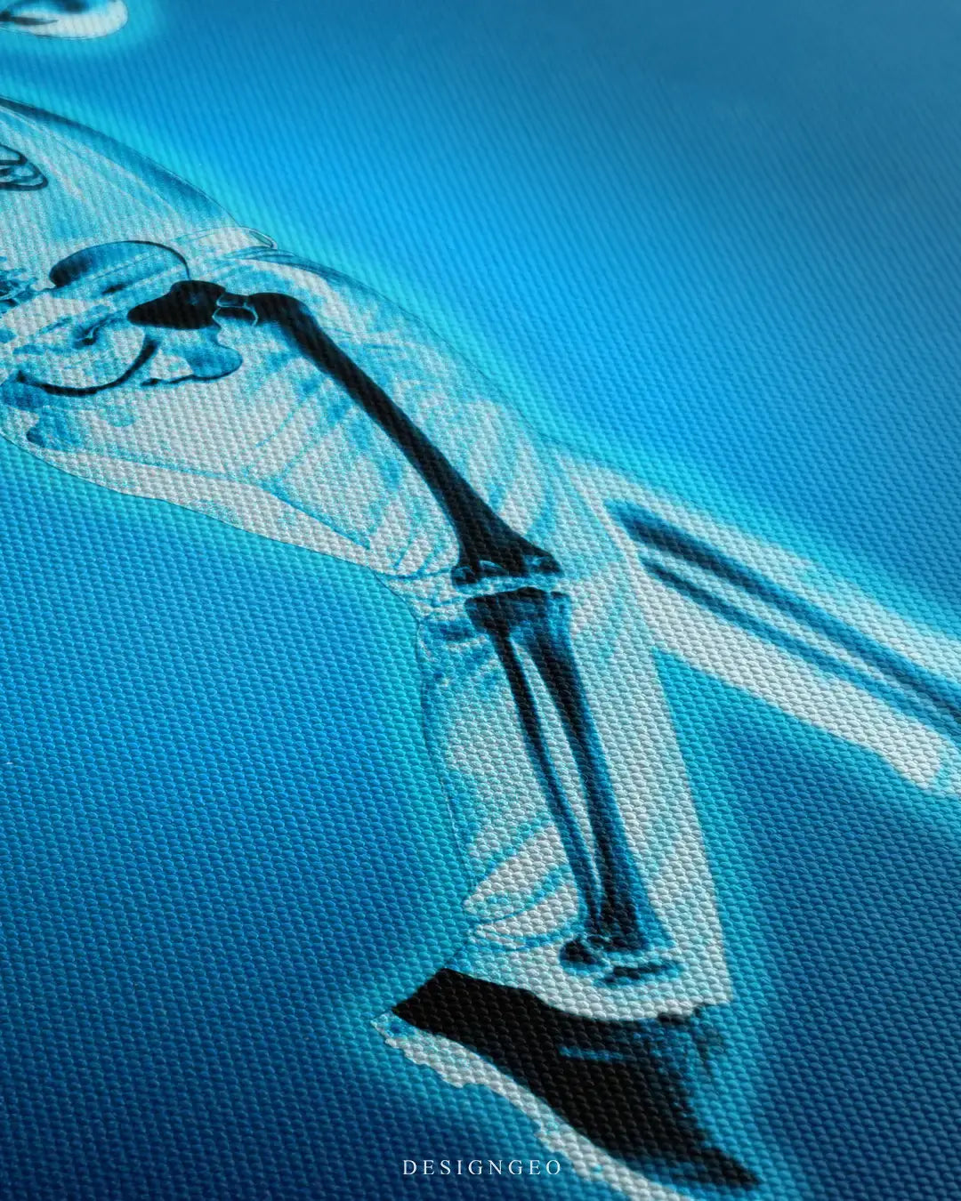 Close-up of modern sports wall art featuring an X-ray anatomy design of a golfer mid-swing, showing the skeletal structure against a bright cyan medical background
