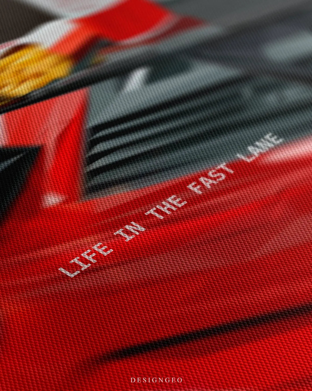 Angled detailed macro texture of fine woven canvas print showing red sports car rear engine deck with burger and fries meal on spoiler and Life In The Fast Lane quote