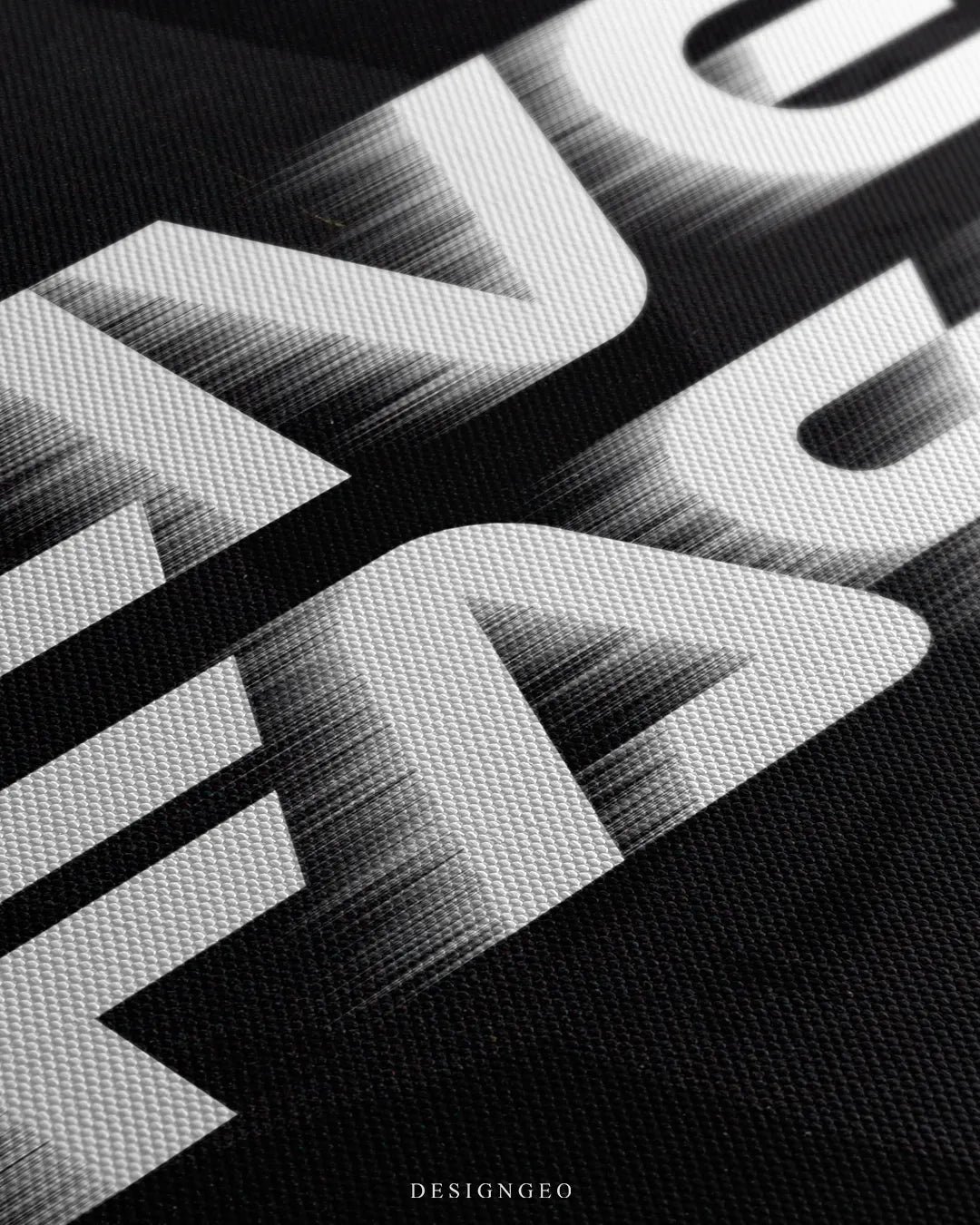 Angled close-up detail shot highlighting the fine canvas texture and white motion blur lines on the Live Fast typography print