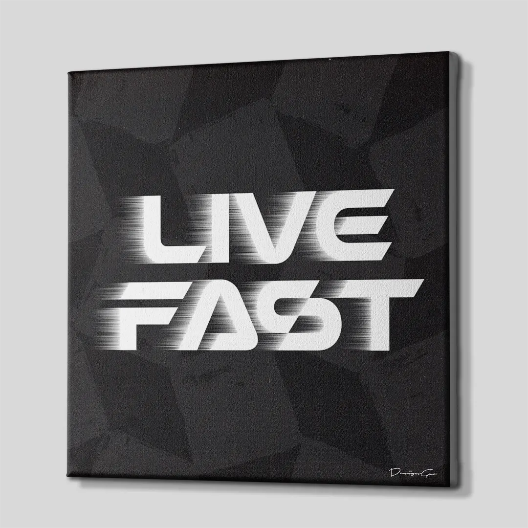 Three-quarter side angle of the Live Fast typography canvas wall art showing gallery-wrapped dark edges mounted on a wooden frame
