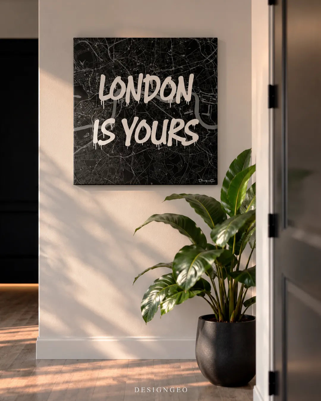 London Is Yours graffiti typography map city street art luxury square canvas wall art mounted on wall in modern hallway with potted plant decor 0.75 inch thin wrap