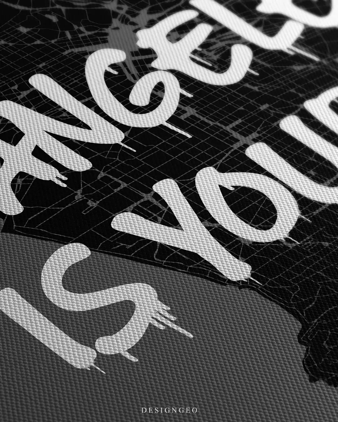 Close-up of a minimalist Los Angeles city map canvas featuring intricate street grids and the motivational phrase "Los Angeles is Yours" in bold white graffiti on a black background