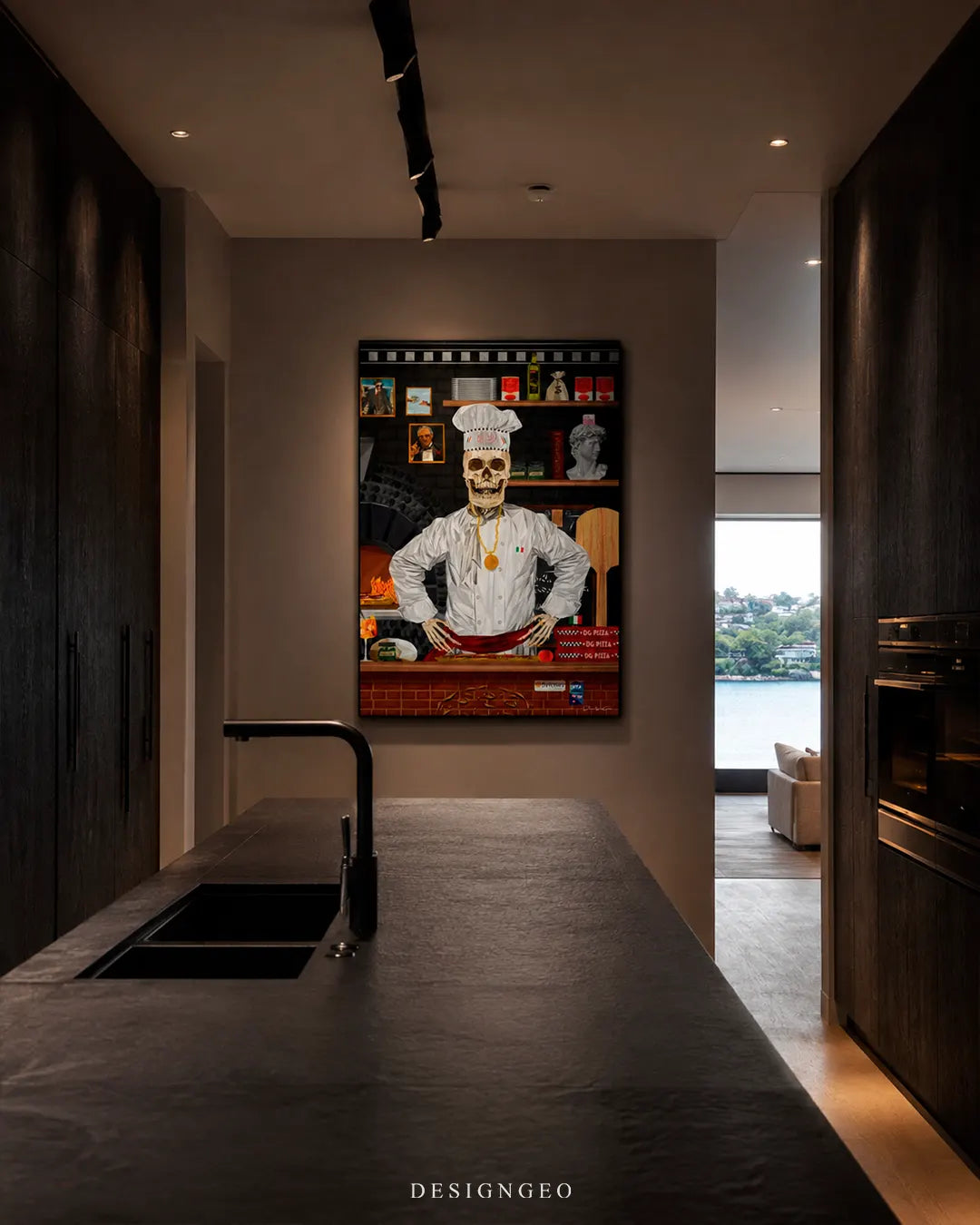 Vertical skeleton pizza chef canvas wall art mounted on a beige wall in a luxury modern dark kitchen with a black marble island and dark wood cabinetry
