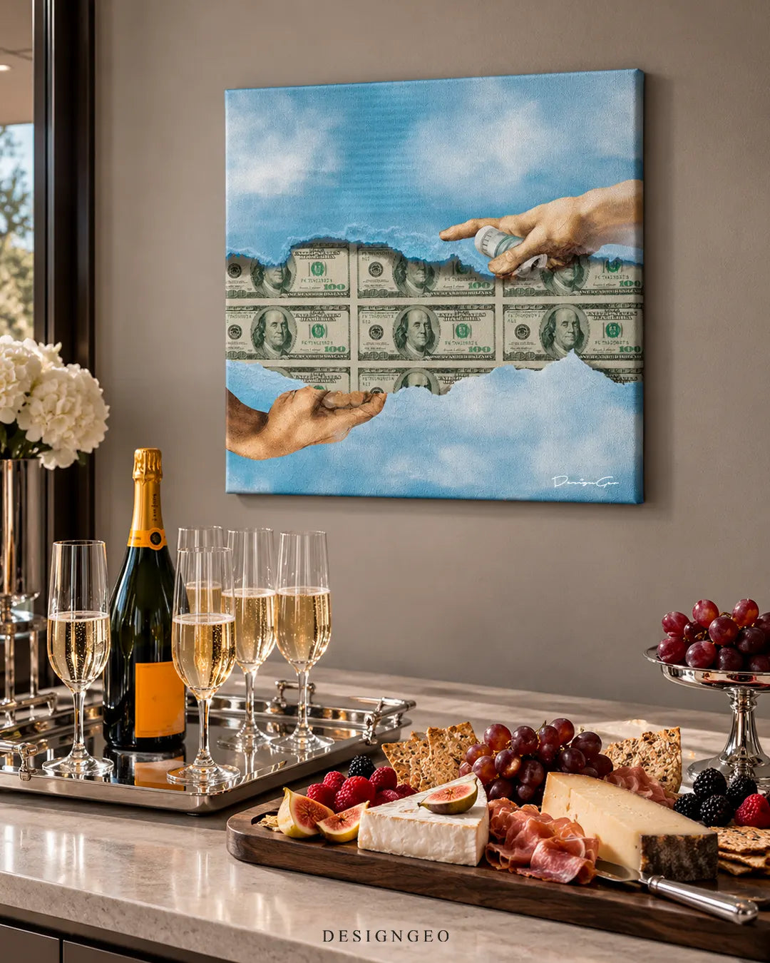 Creation of Adam reaching hands with rolled cash over hundred dollar bills square canvas wall art displayed on a greige wall in an elegant dining room above a champagne tray and charcuterie board 0.75 inch thin wrap
