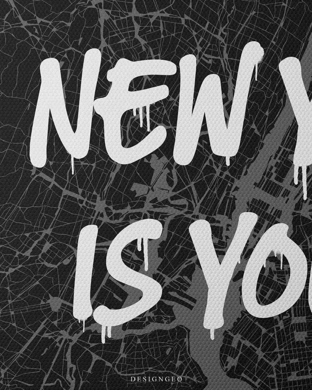 Detailed view of the "New York is Yours" art, showcasing the high-contrast white spray-paint lettering layered over the intricate cartographic layout of Manhattan and NYC boroughs