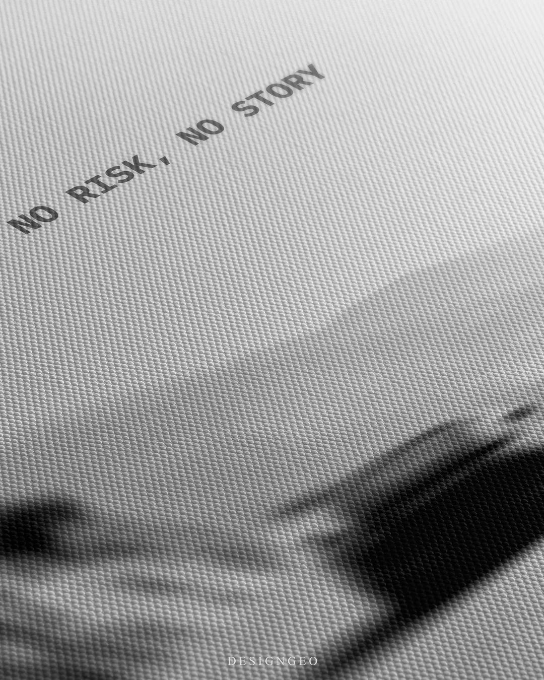 Angled detailed macro texture of fine woven white canvas print showing coastal road turn and sports car motion blur with No Risk No Story quote