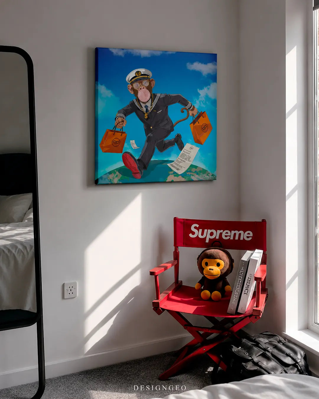 Square Personal Shopper monkey canvas wall art mounted on a white wall above a red director's chair in a modern bedroom setup
