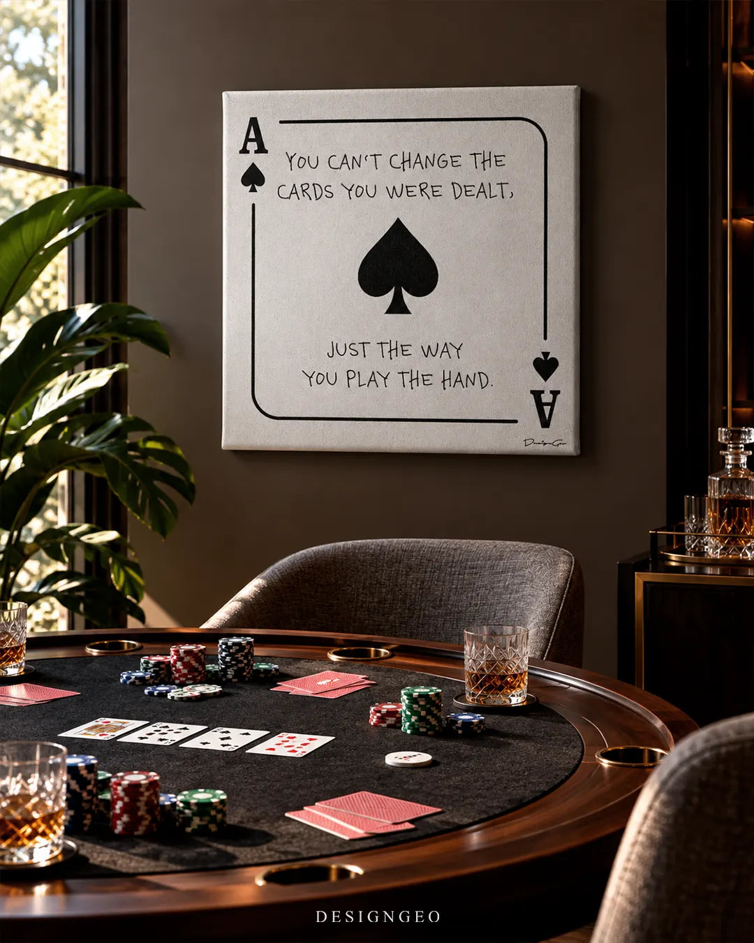 Ace of Spades card design with quote You can't change the cards you were dealt square canvas wall art displayed on a dark grey wall in a luxury poker room above a card table 0.75 inch thin wrap