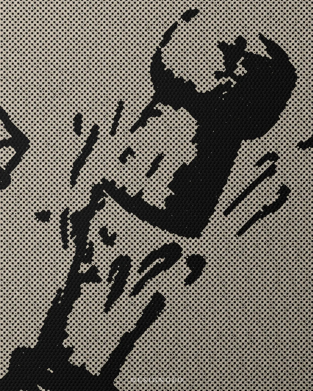 Macro view highlighting the black stencil artwork of the flying cork and splash motion lines printed on a fine textured matte canvas material