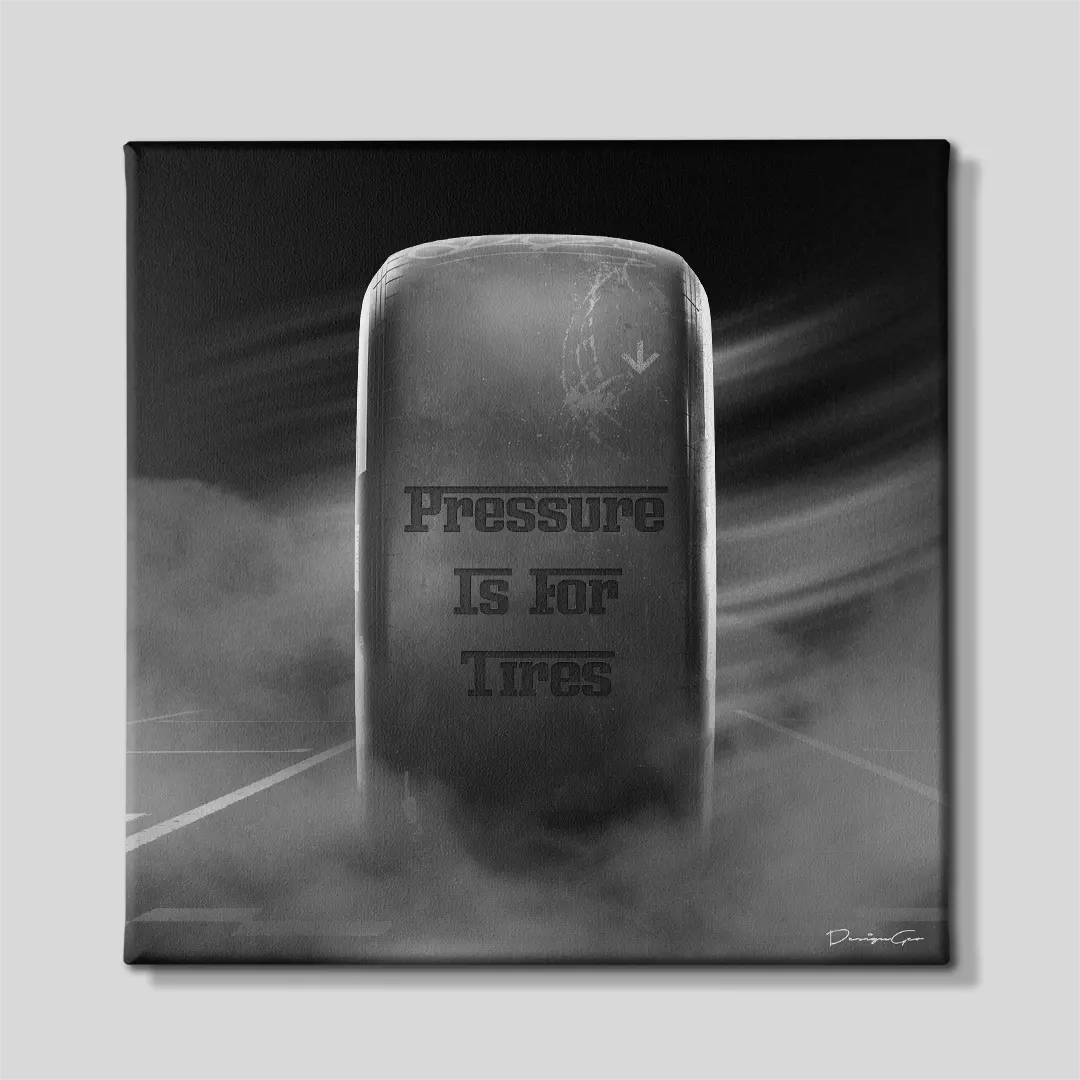 Front view of a square dark gray canvas print featuring a worn race slick tire with black stencil text reading Pressure Is For Tires surrounded by track smoke