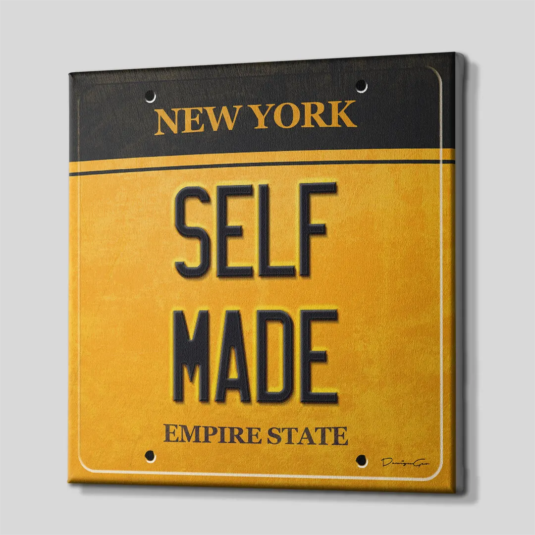 Three-quarter side angle of the New York license plate canvas wall art showing gallery-wrapped yellow and black edges mounted on a wooden frame