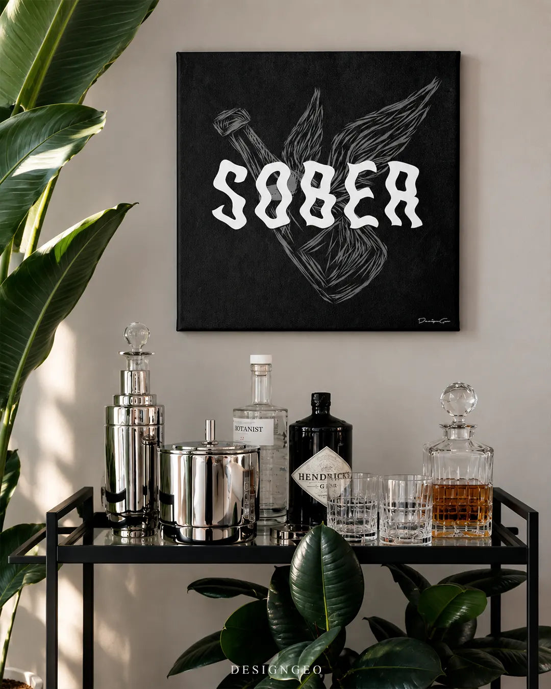 Wavy bold Sober typography with winged liquor bottle outline square canvas wall art displayed on a beige wall in a home bar above a metal bar cart 0.75 inch thin wrap