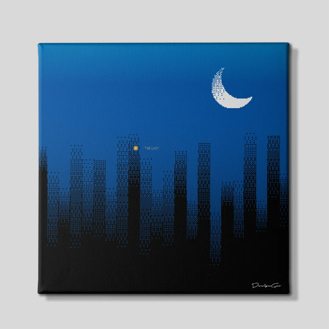 Front view of a square motivational canvas print displaying a dark blue night city skyline, a pixelated crescent moon, and a glowing yellow office window with text reading THE LUCK