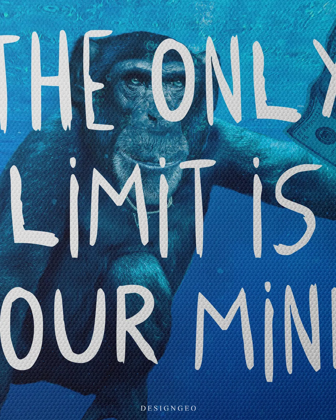 Close up texture view of handwritten The Only Limit Is Your Mind quote printed on fine woven canvas above underwater chimpanzee artwork 0.75 inch thin wrap