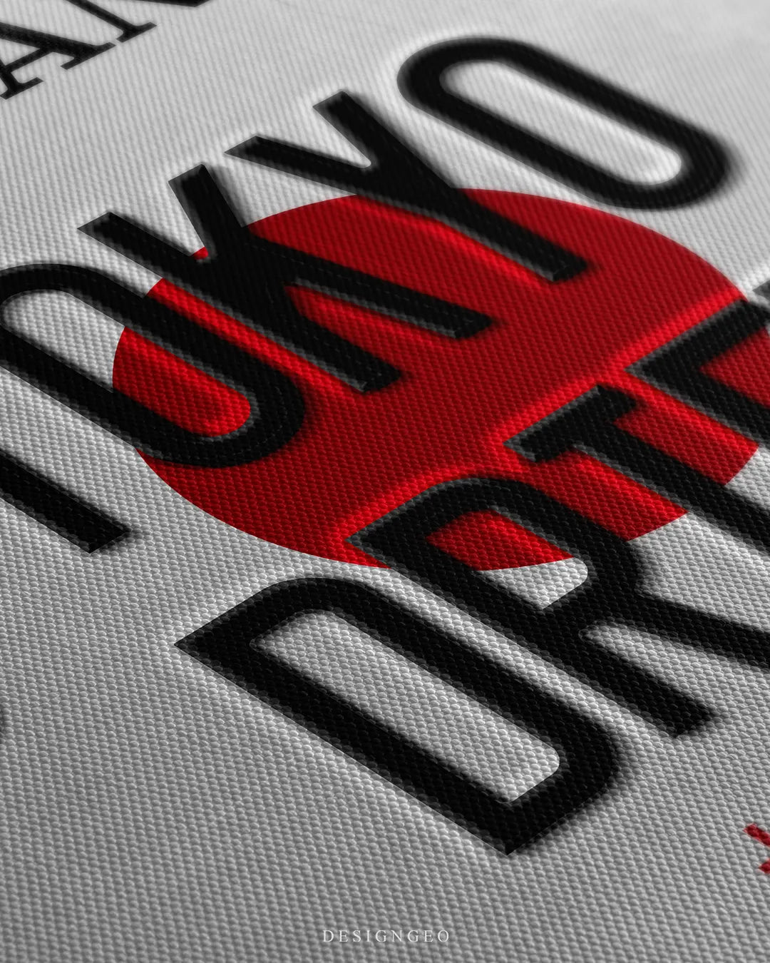 Angled macro view detailing fine woven canvas fabric texture, 3D embossed black text reading Tokyo Drift, and vibrant red Japanese Rising Sun backdrop
