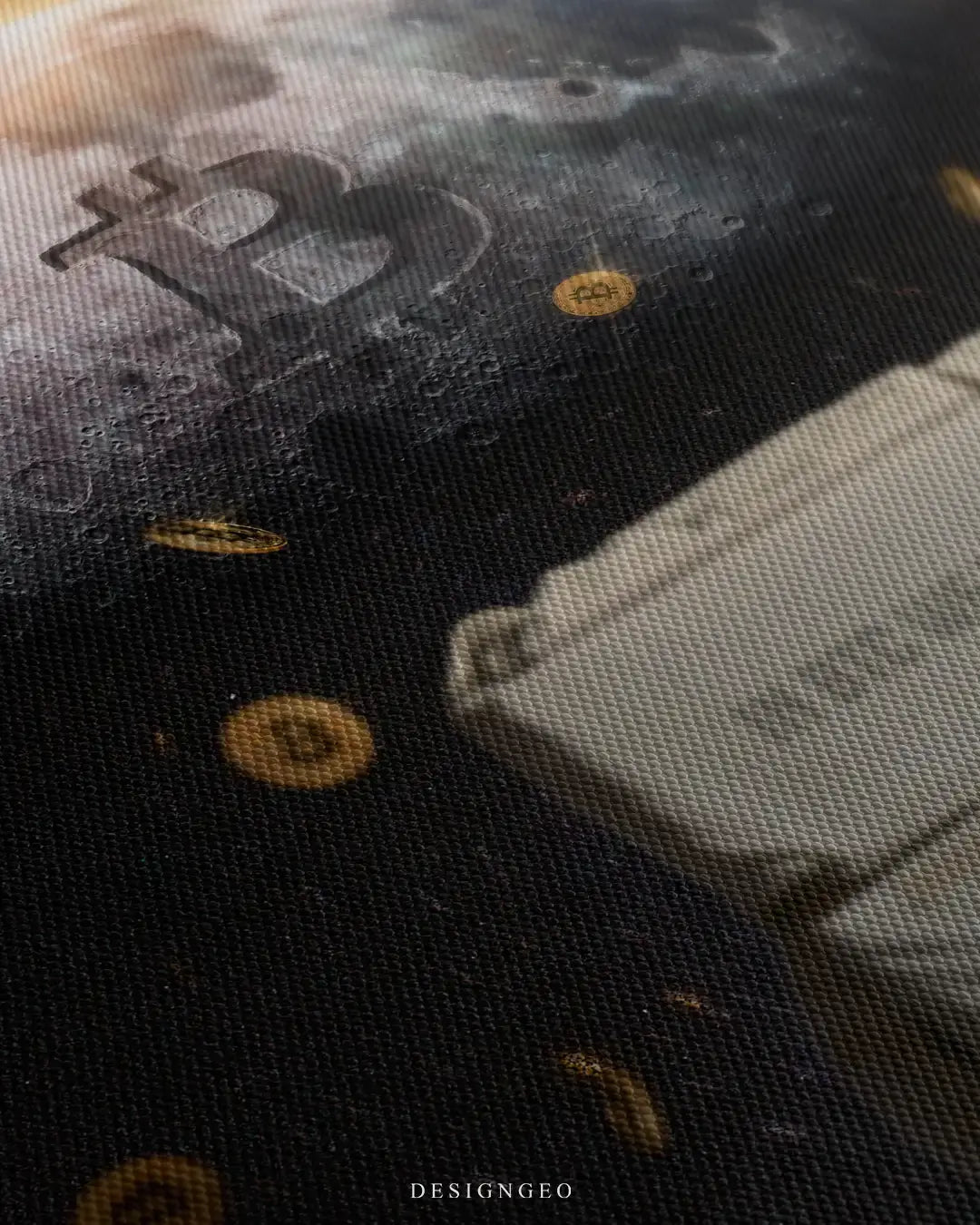 Close-up of digital crypto wall art featuring an astronaut from behind observing a moon with a large B of Bitcoin as a crater, surrounded by golden coins on a deep space background