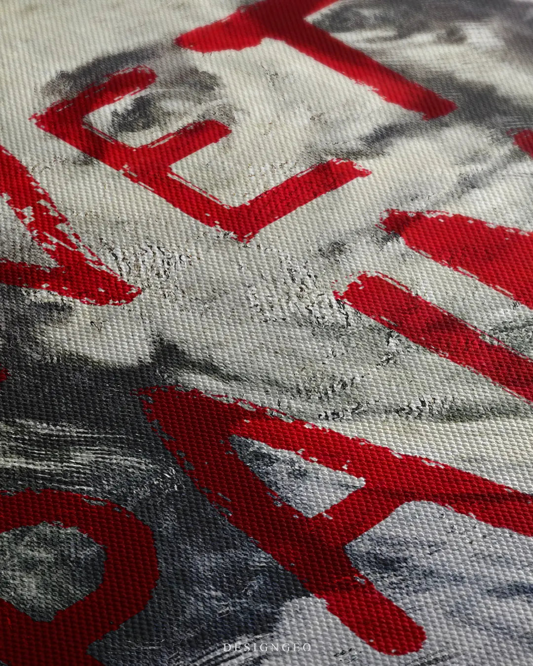 Angled close-up of textured canvas print highlighting brushstrokes on red WET PAINT lettering and 100 dollar bill background