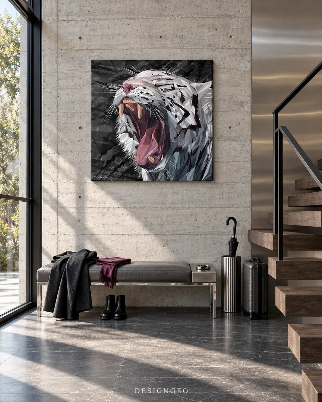 Square black canvas print featuring a geometric roaring white Bengal tiger mounted on a raw concrete wall in a modern industrial entryway next to wooden floating stairs