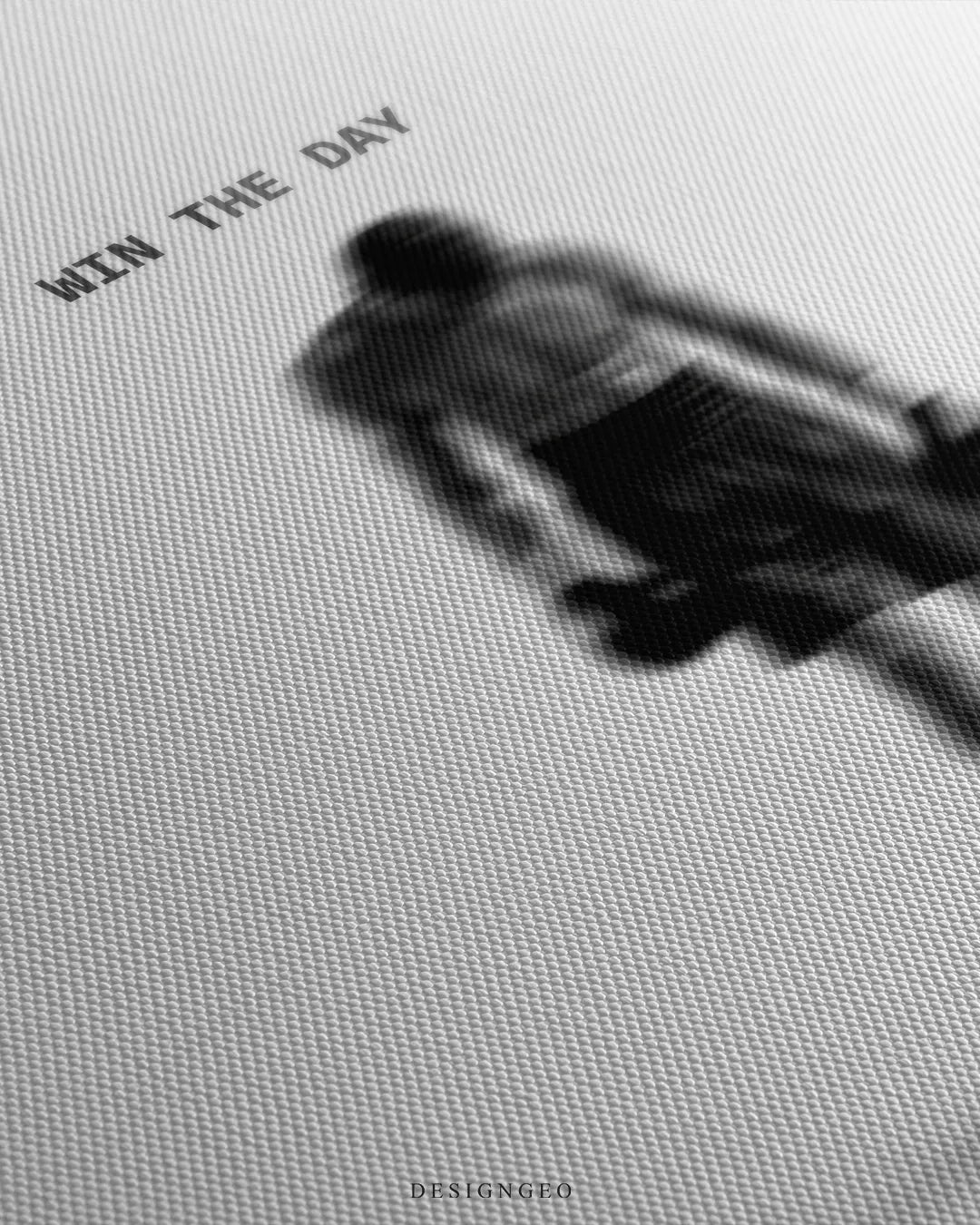 Angled detailed macro texture of fine woven white canvas print showing blurred boxer standing with gloves and Win The Day quote