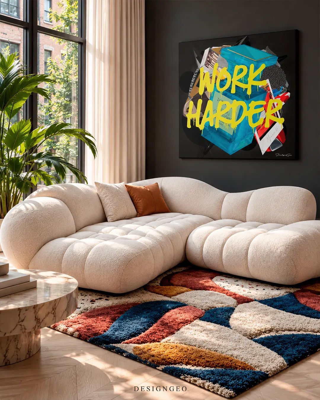 Bright yellow spray paint graffiti text Work Harder over blue luxury perfume bottle square canvas wall art displayed on a dark grey wall in a living room above a cream bouclé sofa 0.75 inch thin wrap